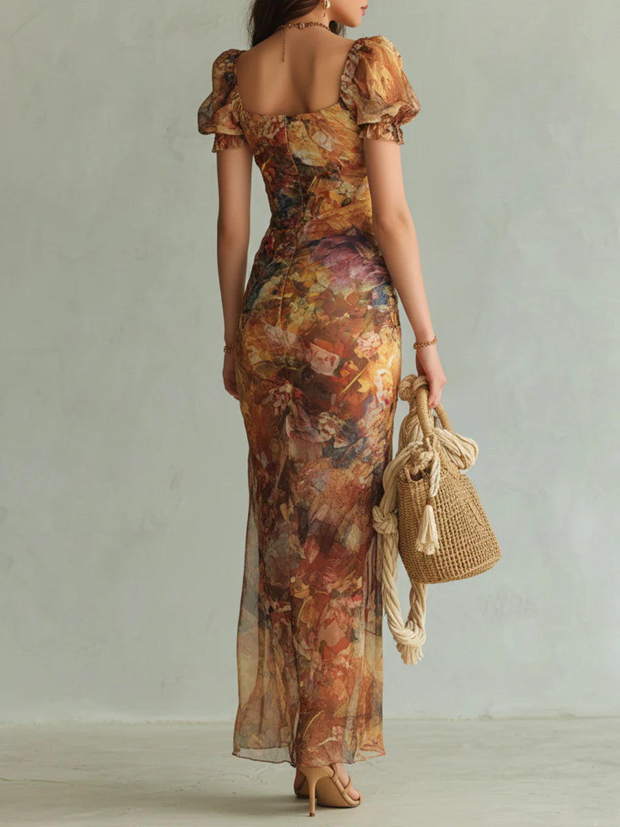 Aria - Lange oranje chiffon jurk met bohemian-stijl olieverfschilderijprint